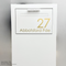 Gold address decal sticker applied to a white Apex letterbox