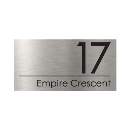 Large brushed silver metallic house sign, 400 x 200 mm, with the house number and street name cut through to a black plate