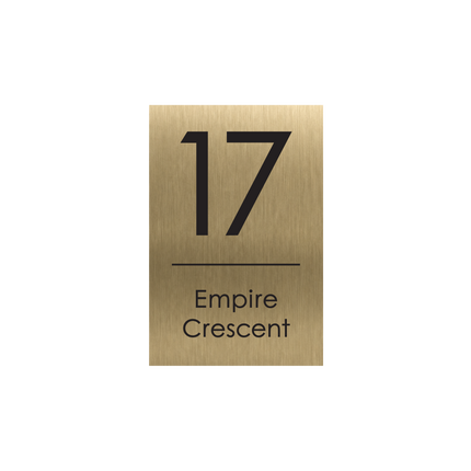 Medium portrait brushed gold metallic house sign, 200 x 300 mm, with the house number and street name cut through to a black plate
