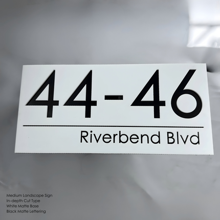 Custom laser cut sign white base black letters