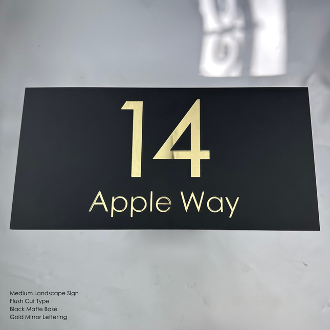 custom sign black base gold letters