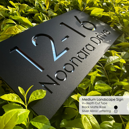 Custom sign with on a green leafy background